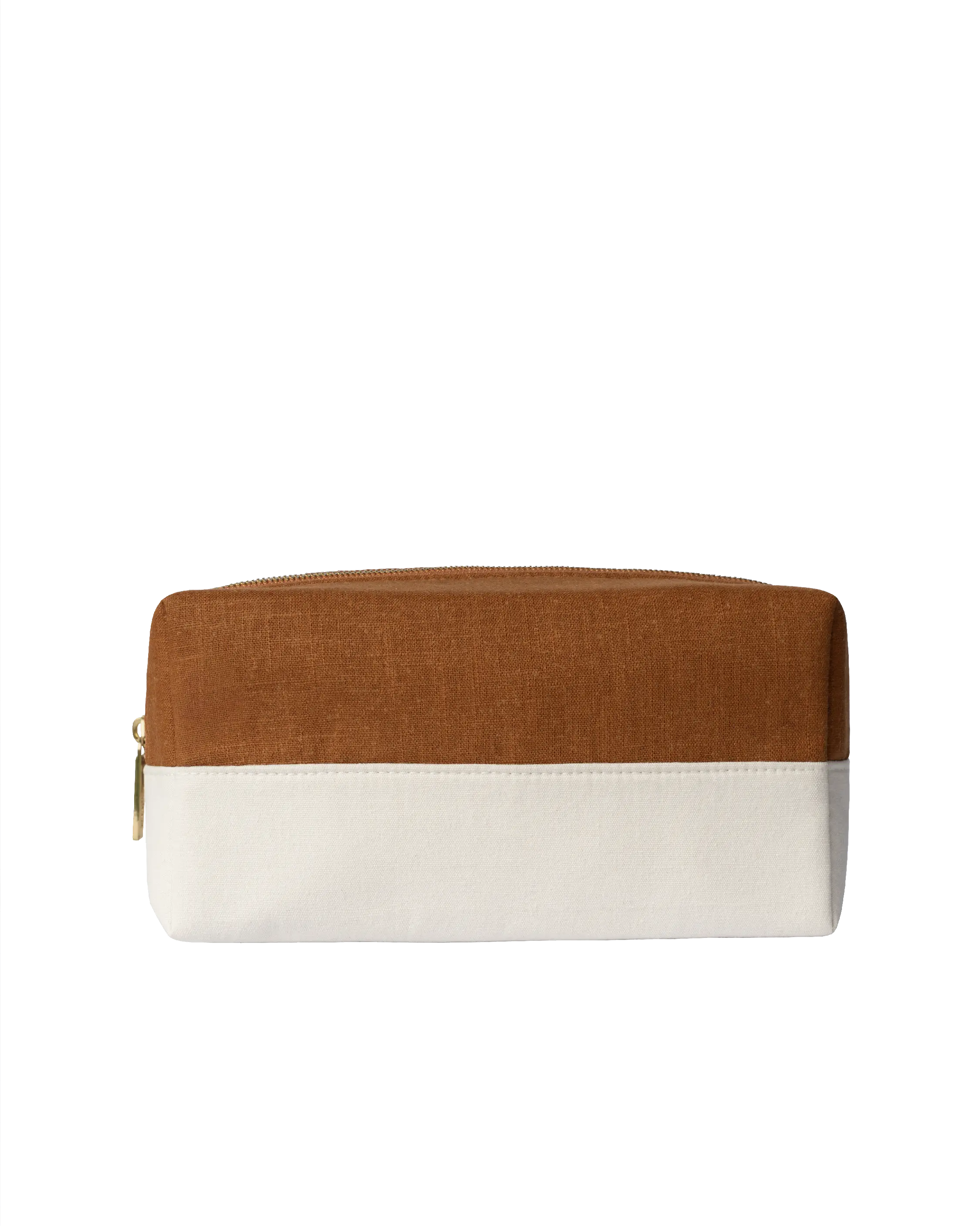 Blu & Green's lightweight, durable Travel Bag, made with a structured cotton canvas base, layered with a burnt-orange linen top, and a custom metal zipper.