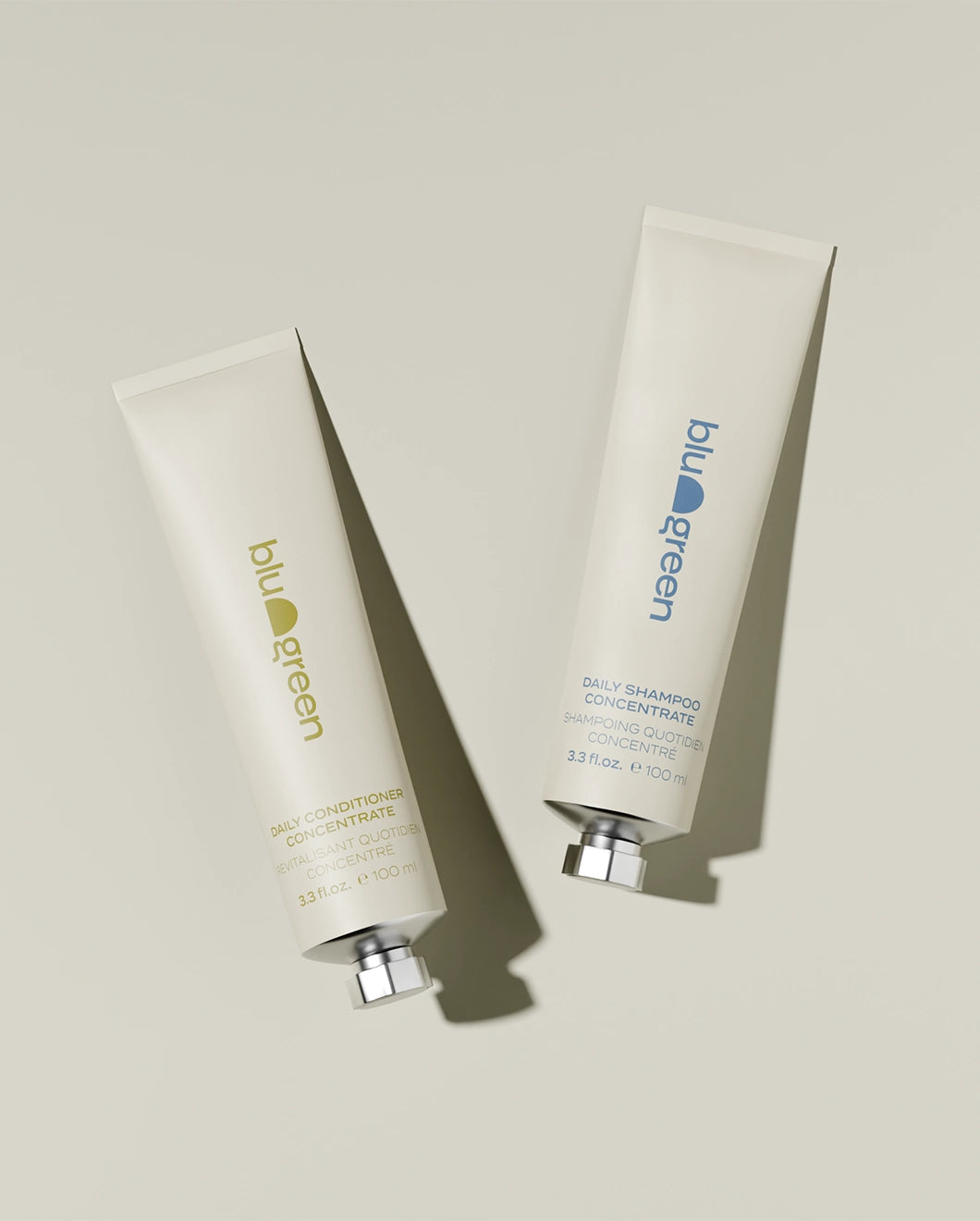 Blu & Green's Daily Shampoo and Conditioner Concentrates in sustainable, plastic free packaging.