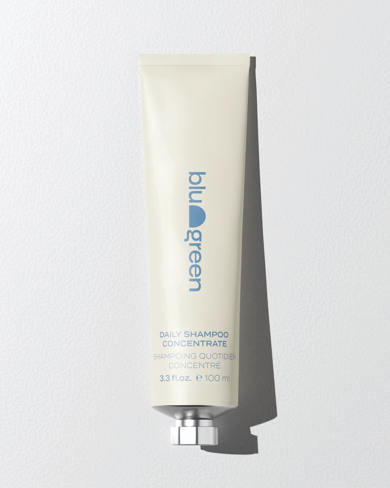 Blu & Green Daily Shampoo Concentrate in 100ml eco-friendly aluminum tube, sustainable hair care.