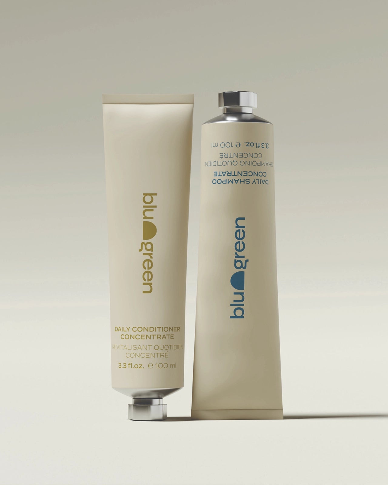 Blu & Green Daily Shampoo and Conditioner Concentrates in 100ml eco-friendly aluminum tubes.