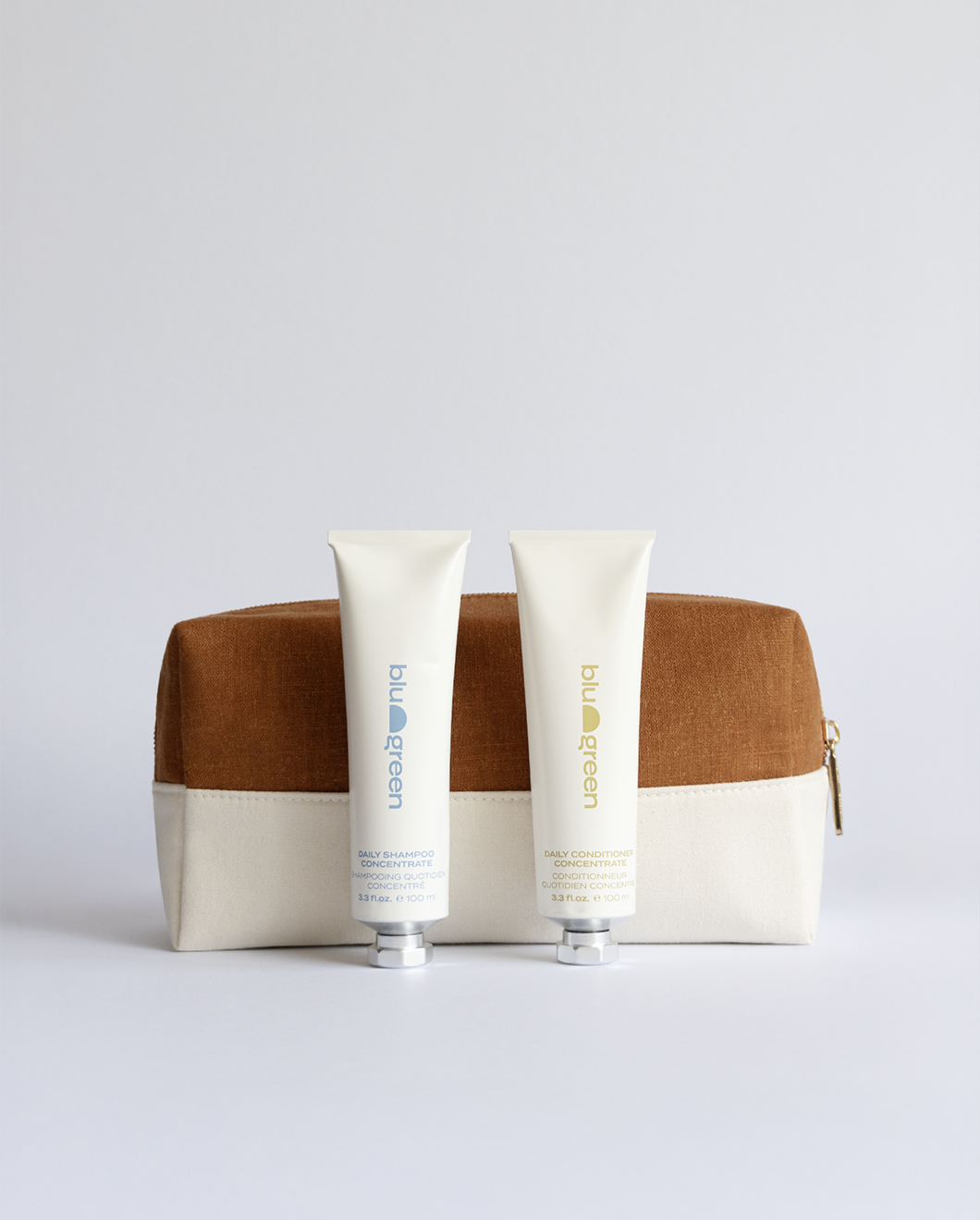 Blu & Green’s exclusive Holiday Hair Care Set with Daily Shampoo and Conditioner Concentrates in a minimalist canvas gift bag.