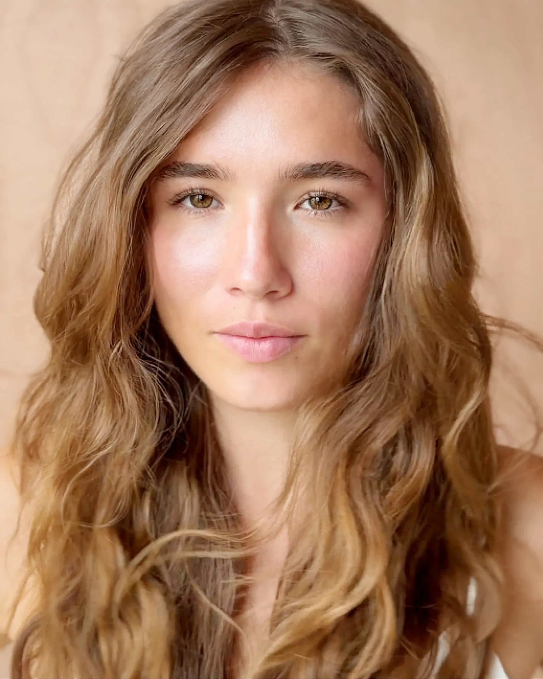 Close-up of soft, frizz-free waves achieved with Blu & Green Rise & Set styling cream