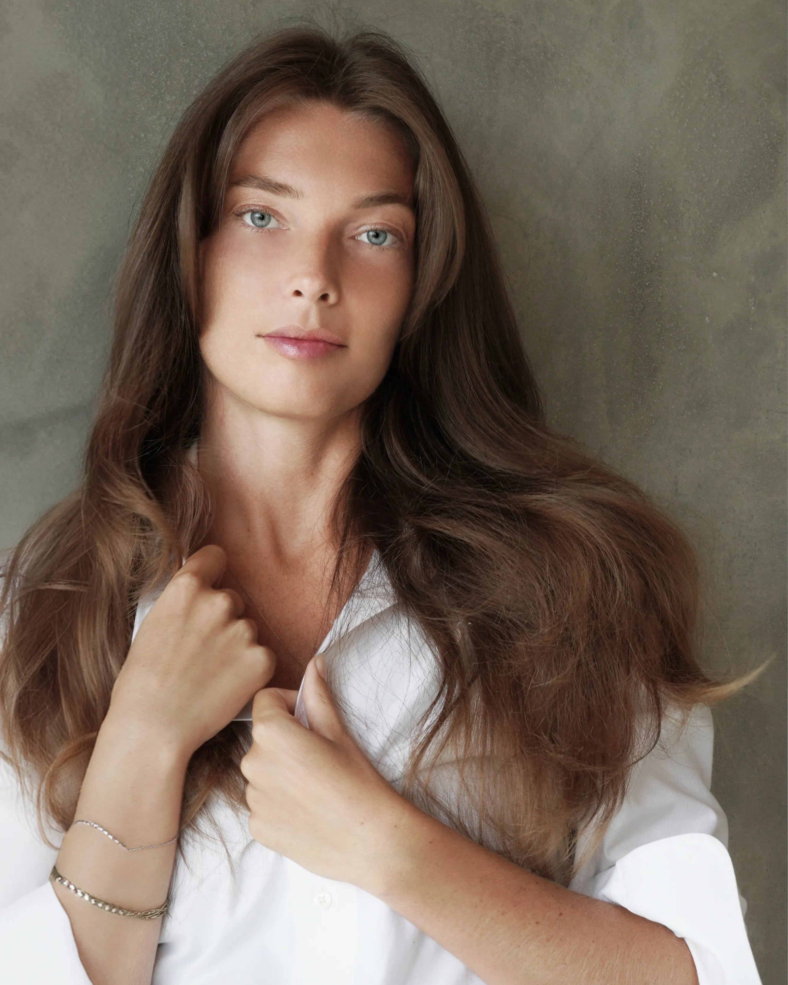 Blow-dried, polished hair styled using Rise & Set Light Styling Cream