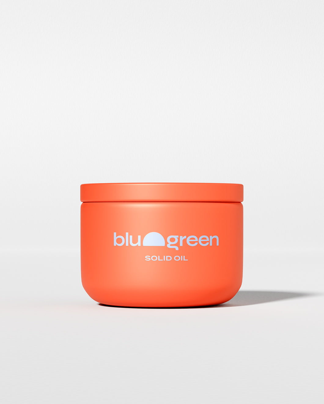 blu and green solid oil 1oz tin jar warm red with pale blue logo, studio photography, white ground, and strong light.